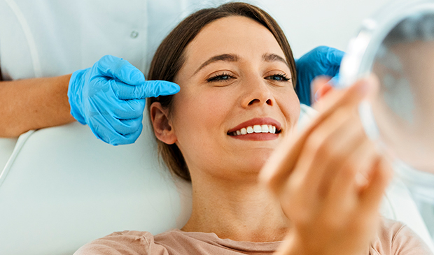 Woman looking in mirror