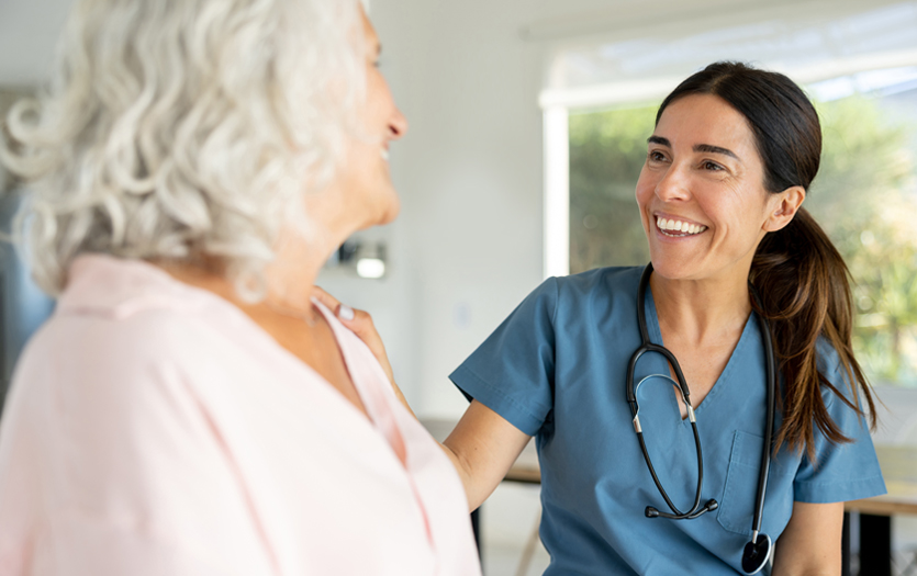 Provider talking to female patient
